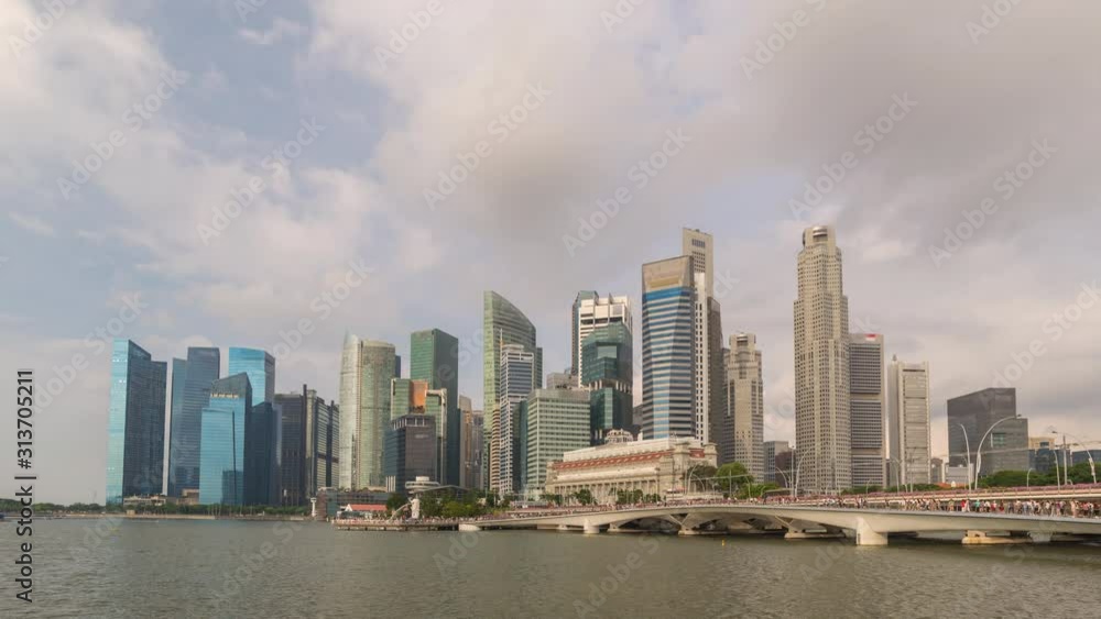 Singapore time lapse 4K, city skyline timelapse at Marina Bay waterfront business district Singapore time lapse 4K, city skyline timelapse at Marina Bay waterfront business district