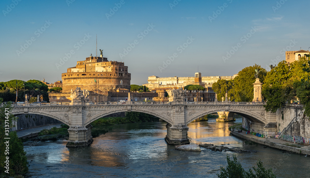 Beautiful view on river Tiber and Castel Saint Angelo in Rome. Homeless people camp under bridge - Rome, eternal city, Italy