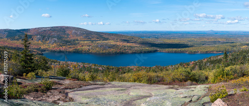 Panorama of a colorful autumn forest and lake in Acadia National Park, Maine