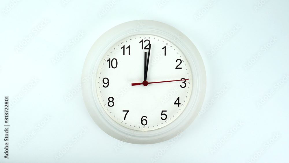 White clock beginning of time 12.01 am or pm, on white background, Copy space for your text, Time concept. White clock beginning of time 12.01 am or pm, on white background, Copy space for your text, Time concept.