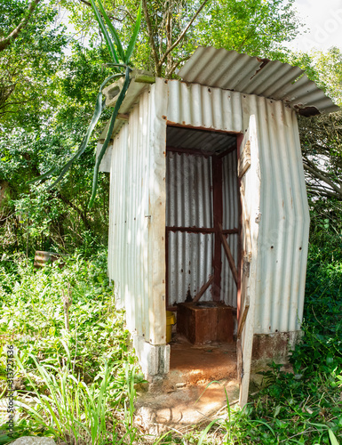 Bilde på lerret A Zinc House Pit Latrine In The Woods With Hylocereus Cactus On The Roof