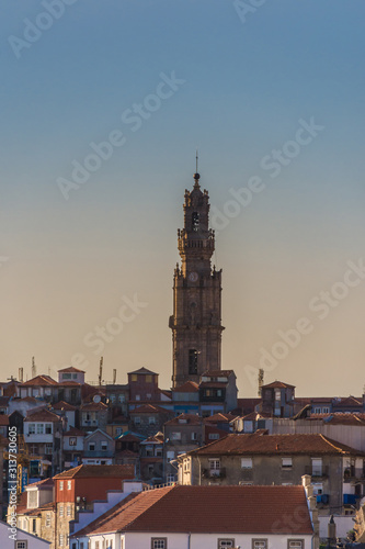 Oporto, Portugal - Old town skyline with colorful houses and old Clerigos tower