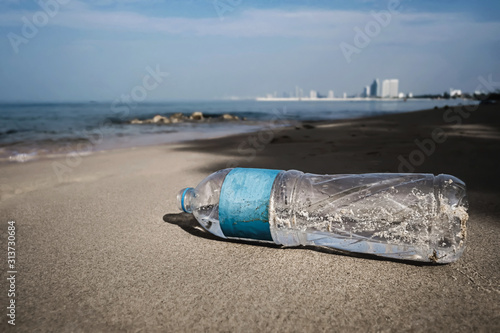 plastic water bottle on the beach