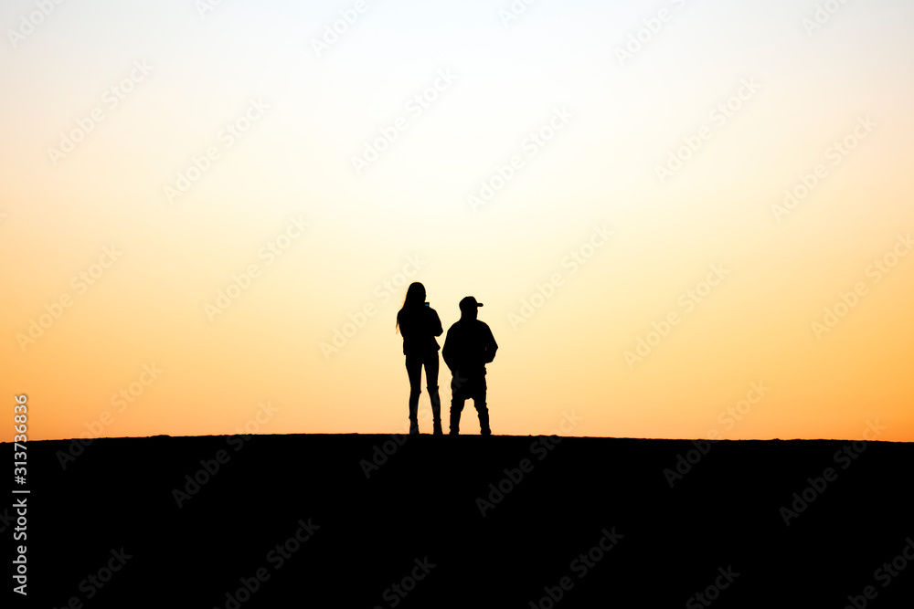 Two People Standing Together