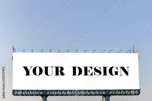 Mockup image of Blank billboard white screen posters with clouds sky for advertising