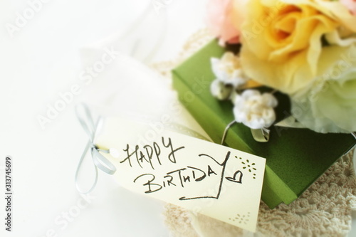 Artificial flower and gift box with ribbon for holiday image