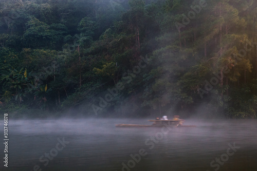 Travel on bamboo rafting in Thailand.