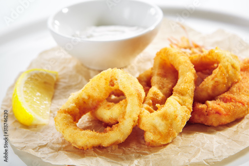 Breaded Fried Squid Rings and Shrimp with Tartar Sauce © Ryzhkov