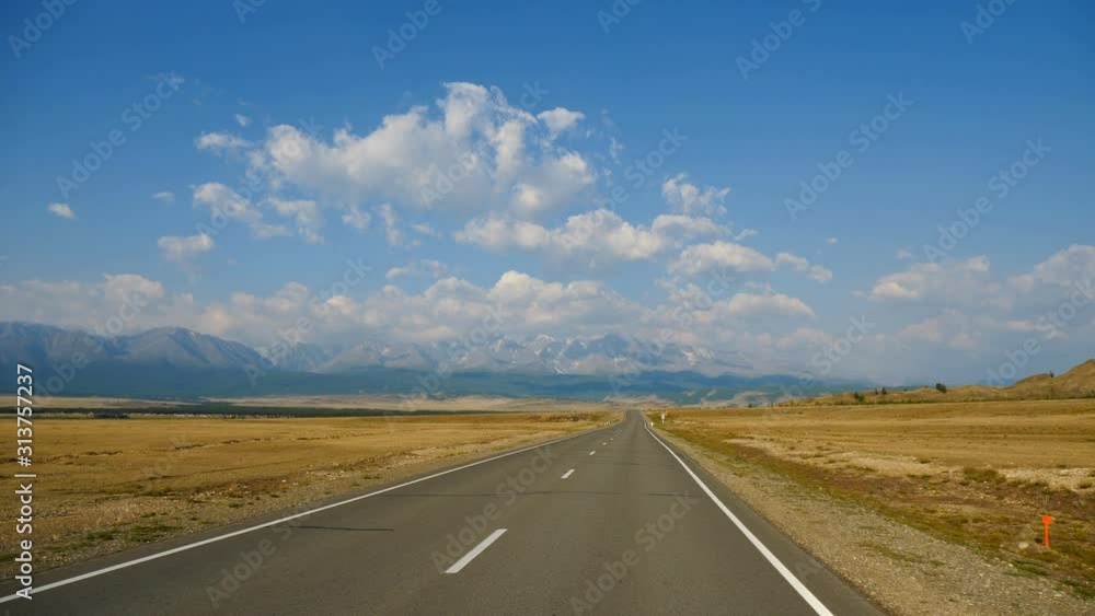 camera flies over the road through the mountains and the steppe camera flies over the road through the mountains and the steppe