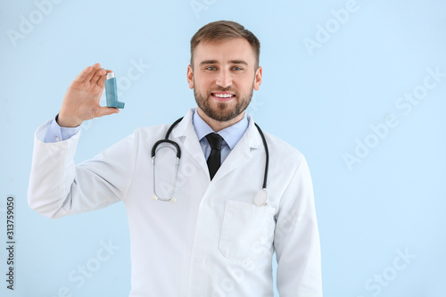 Portrait of male doctor wit...