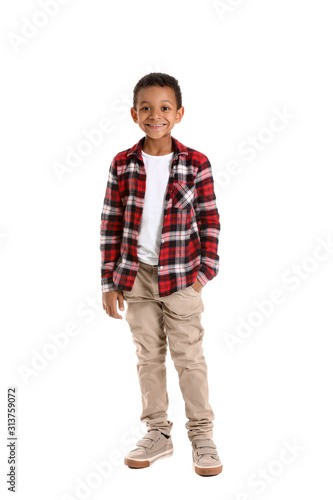 Cute fashionable African-American boy on white background