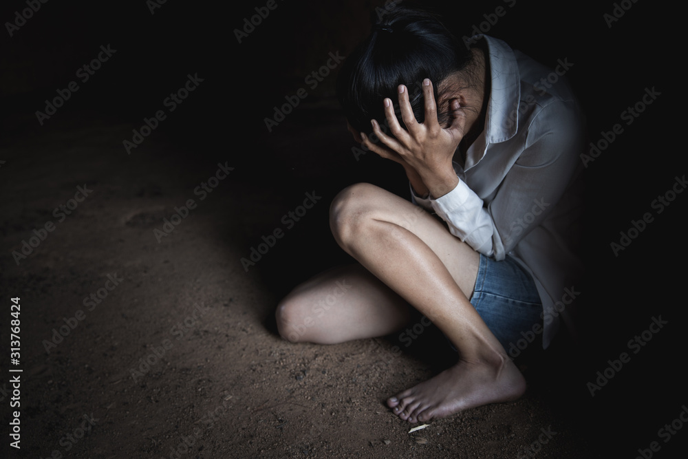 Young depressed woman, domestic and rape violence,beaten and raped sitting in the corner, Domestic violence. Young depressed woman, domestic and rape violence,beaten and raped sitting in the corner, Domestic violence.