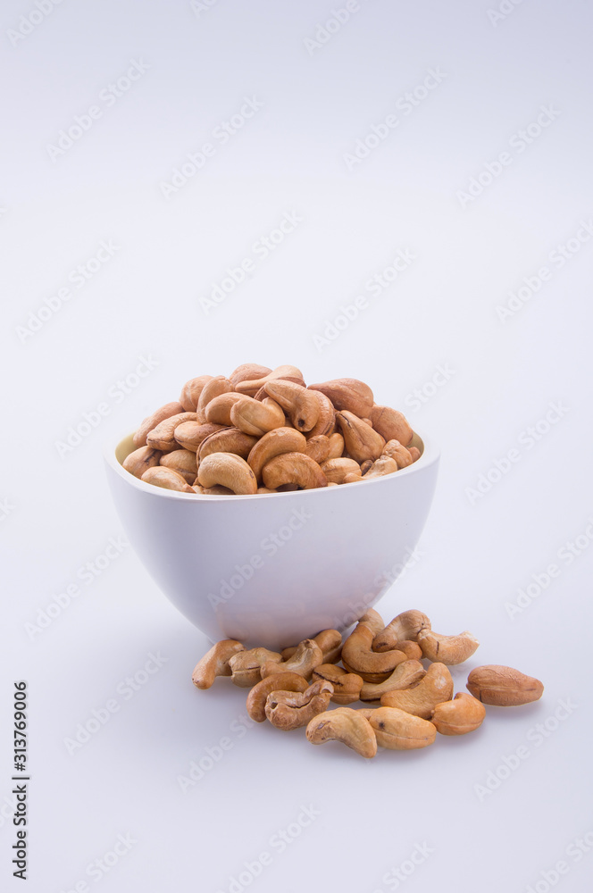 nuts or cashew nuts on the background new. nuts or cashew nuts on the background new.
