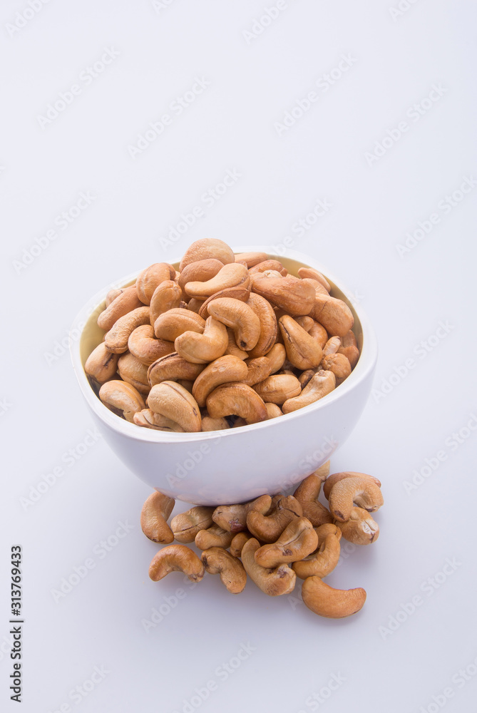 nuts or cashew nuts on the background new. nuts or cashew nuts on the background new.