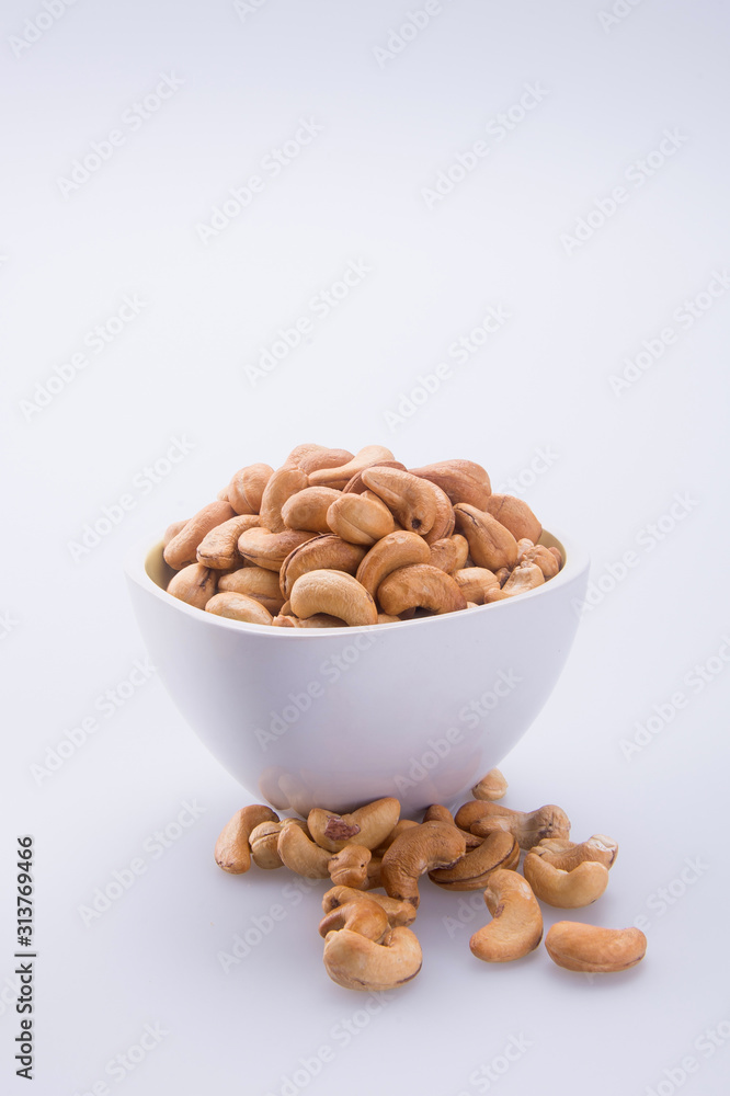 nuts or cashew nuts on the background new. nuts or cashew nuts on the background new.