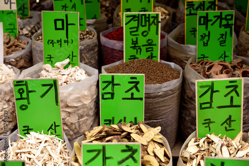Photography Containers of traditional Korean natural medicine, bark, roots and herbs