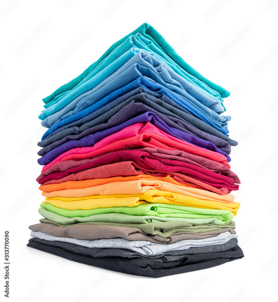 Stack of colorful t-shirt isolated on white background. File contains a path to isolation. Stack of colorful t-shirt isolated on white background. File contains a path to isolation.