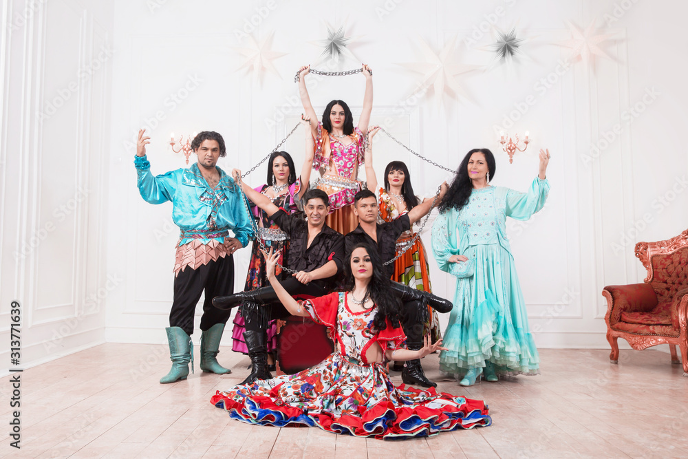 professional Gypsy dance ensemble posing on stage