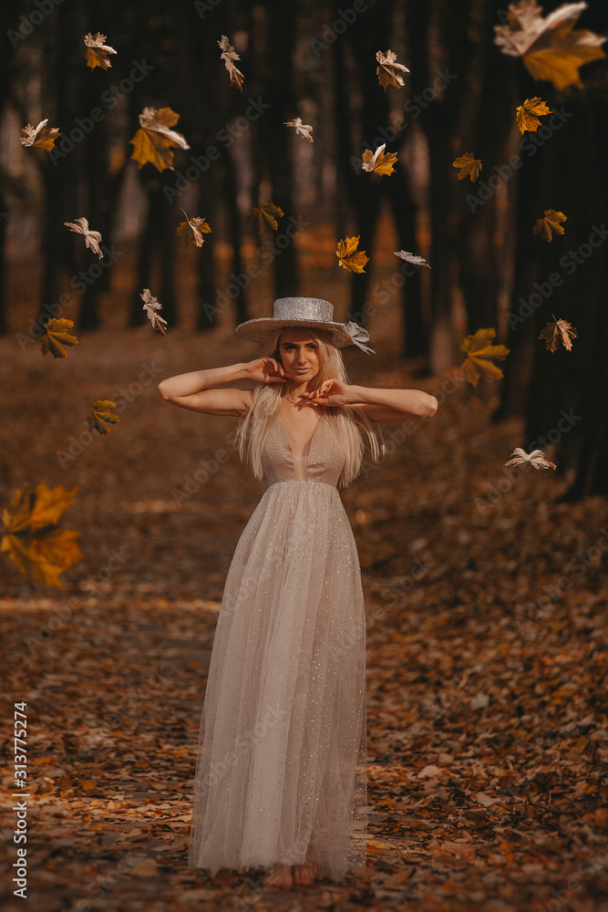 Beautiful woman in autumn photoshoot