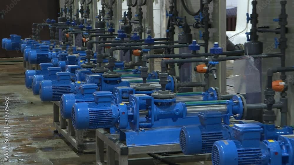 The engine room at the treatment facilities .Equipment inside the industrial premises . Effective water treatment concept. The engine room at the treatment facilities .Equipment inside the industrial premises . Effective water treatment concept.