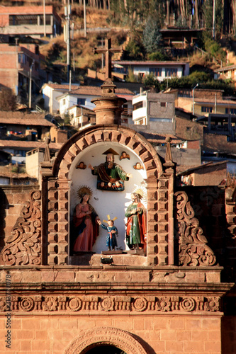 Small altar with saints on the outside of the Cathedral of Cuzco in Peru