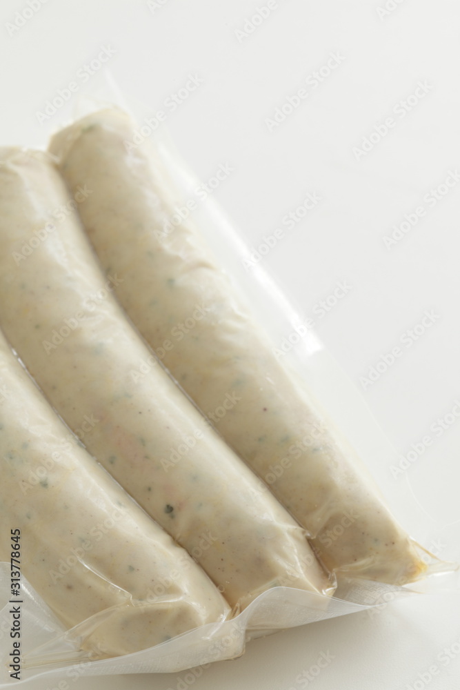 Packed food, pork and spice sausage on white background with copy space Packed food, pork and spice sausage on white background with copy space
