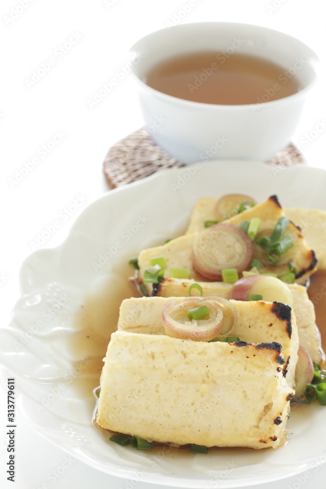 Pan fried tofu and scallion with soy sauce for healthy food image