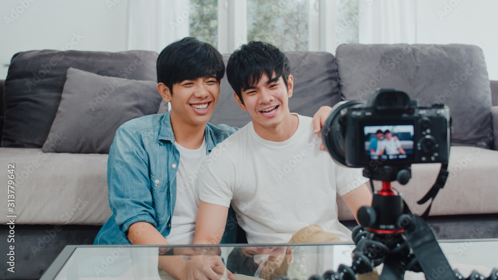 Young Asian gay couple influencer couple vlog at home. Teen korean LGBTQ+  men happy relax fun