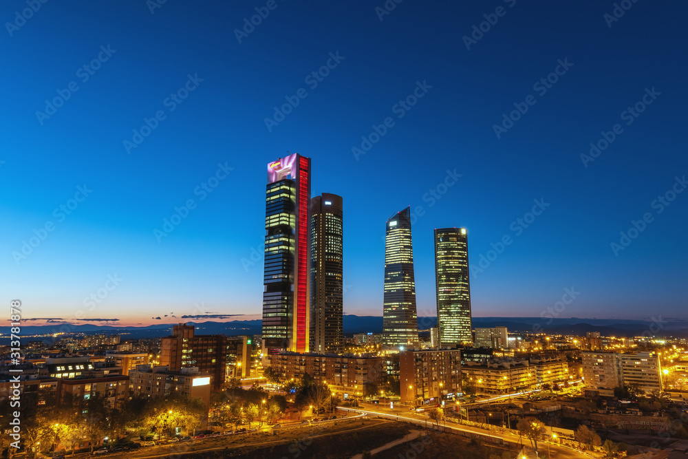 Madrid Spain, night city skyline at financial district center with four towers