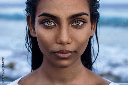Beautiful indian woman with blue eyes  photo