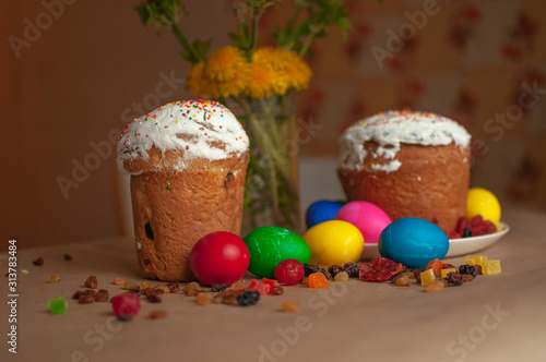 Easter treat - a cake with raisins and protein glaze and colorful eggs