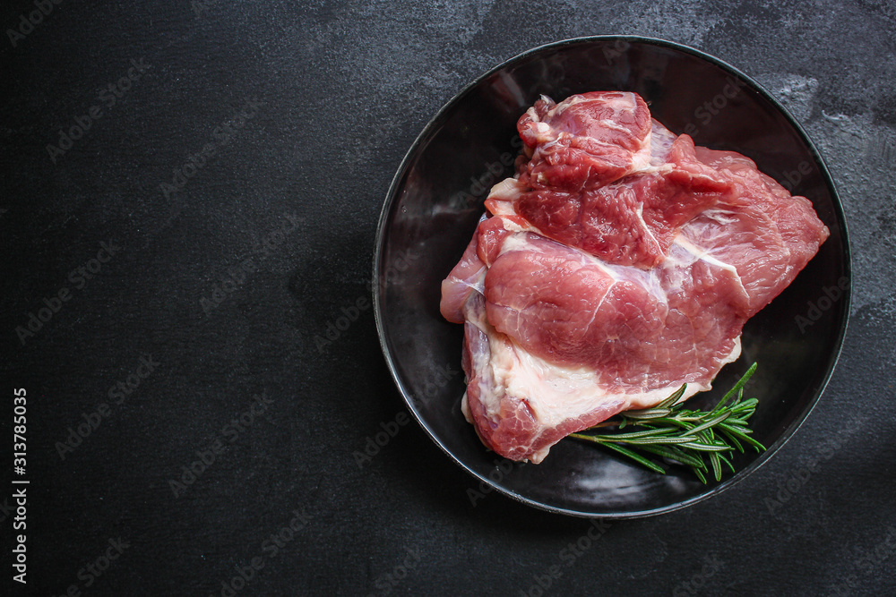 raw meat, piece of pork (healthy food, vitamins ingredients) menu concept. food background. top view. copy space raw meat, piece of pork (healthy food, vitamins ingredients) menu concept. food background. top view. copy space