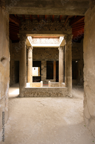 Courtyards surrounded by four pillars inside a house at the ancient city of Pompeii, near Naples, Italy © schusterbauer.com