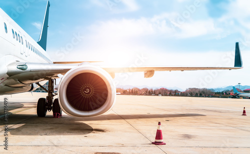 Airport runway apron and passenger aircraft