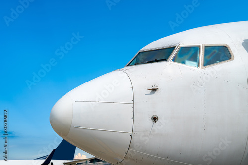 Airport runway apron and passenger aircraft