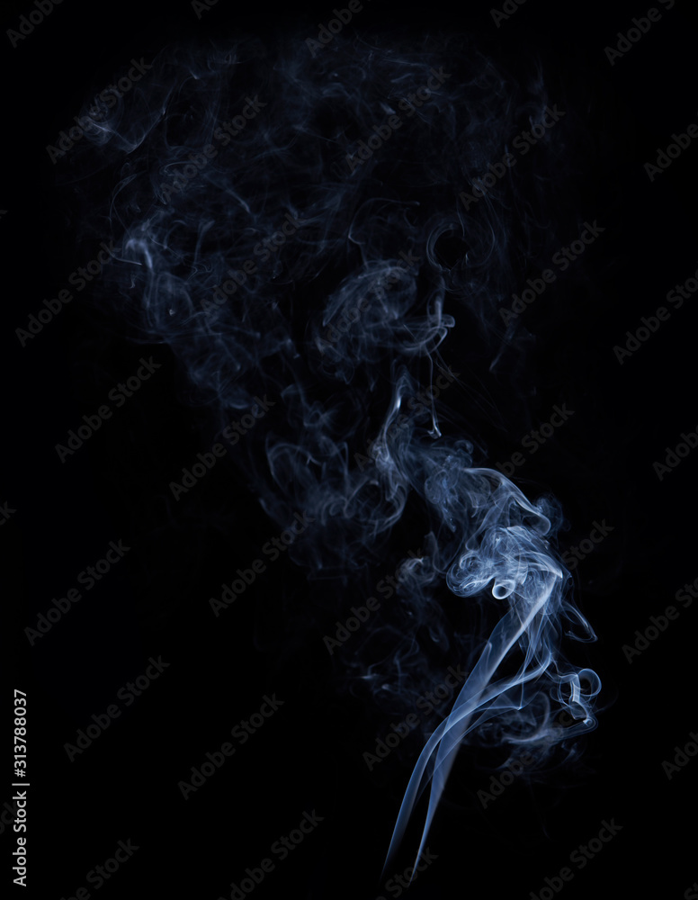 Photo of real white smoke on black background Photo of real white smoke on black background