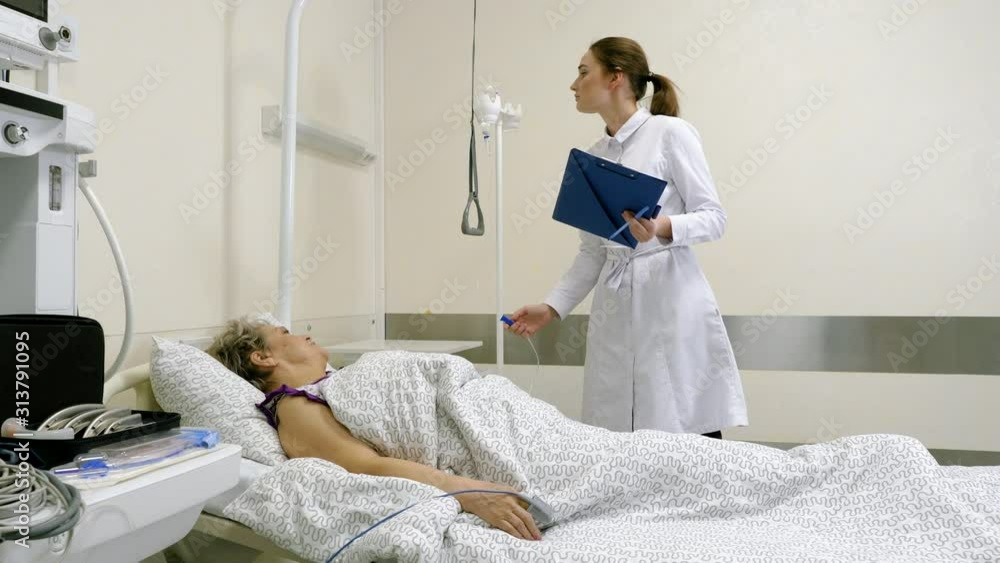 Doctor talks to elderly female patient. 4K Doctor talks to elderly female patient. 4K