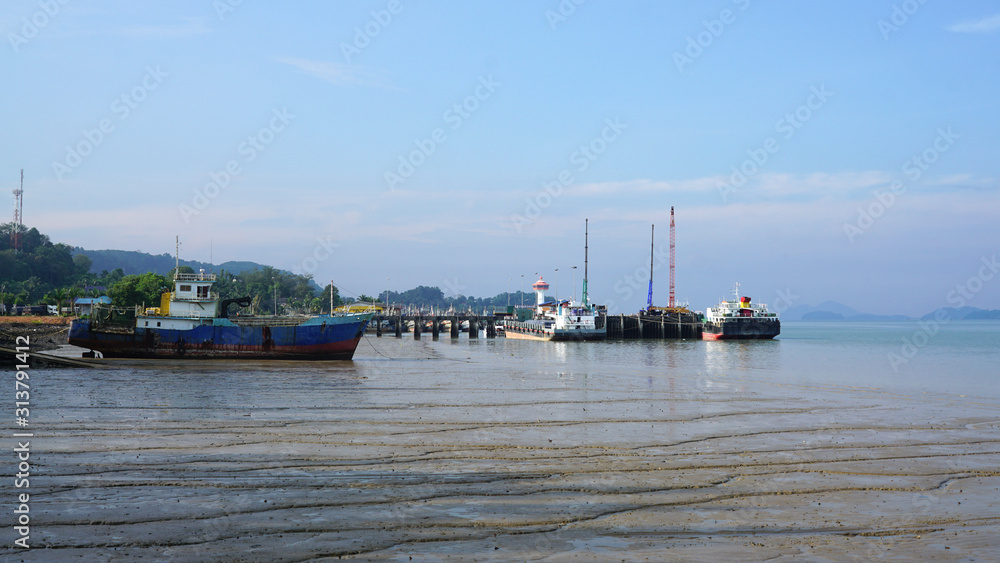 Panorama view of the port and logistic ship with beautiful ocean background