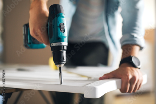 Wallpaper Mural Close up of screwing machine. Torontodigital.ca