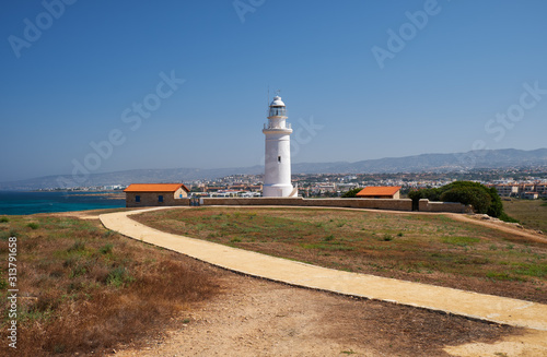 Yellow road going to the Paphos lighthouse. Cyprus