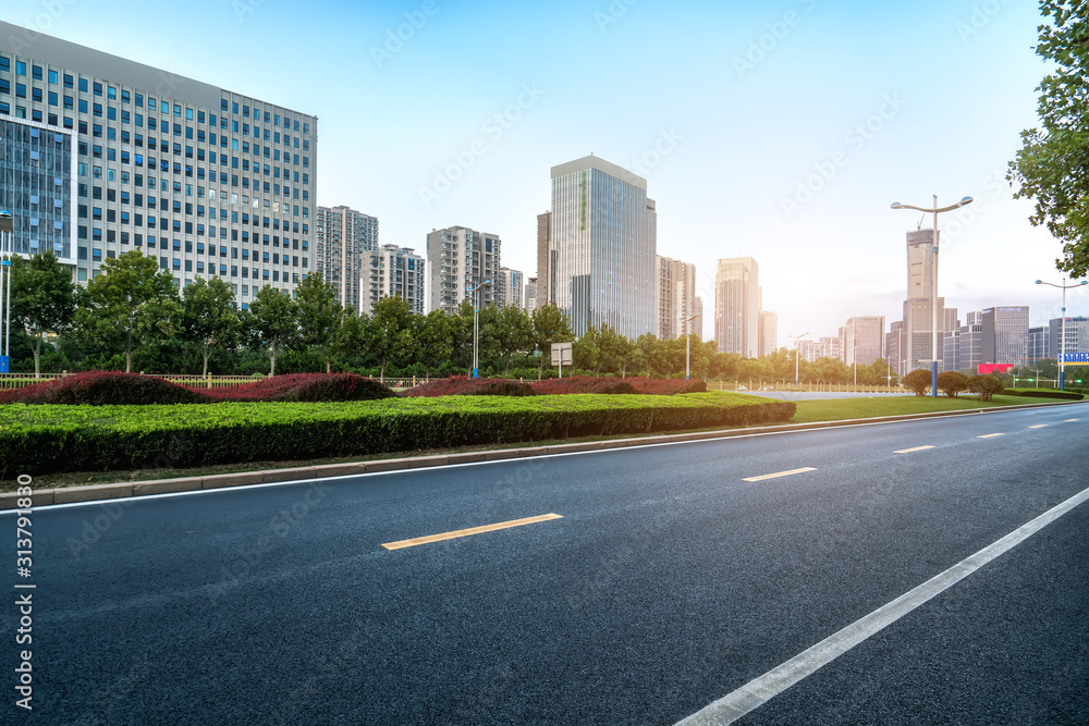 Road pavement and modern building in Jinan financial district