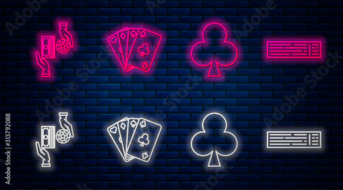 Set line Playing cards, Playing card with clubs symbol, Casino chips exchange on stacks of dollars and Deck of playing cards. Glowing neon icon on brick wall. Vector
