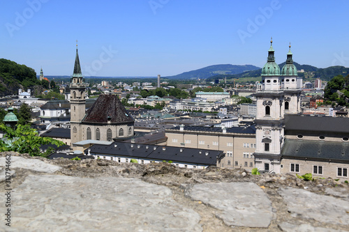 Franciscan Church (left) and the Cathedral of Saints Rupert and Vergilius (right) seen from the Mönchsberg in Salzburg, Austria photo