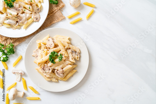 Canvas Print penne pasta carbonara cream sauce with mushroom
