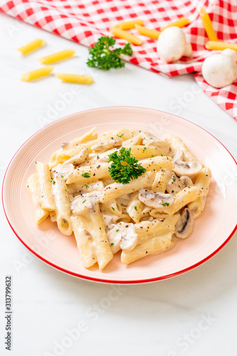 penne pasta carbonara cream sauce with mushroom