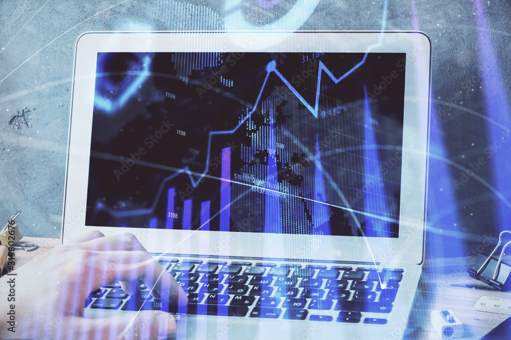 Forex graph with businessman working on laptop on background. Concept of hardworking. Multi exposure. Forex graph with businessman working on laptop on background. Concept of hardworking. Multi exposure.