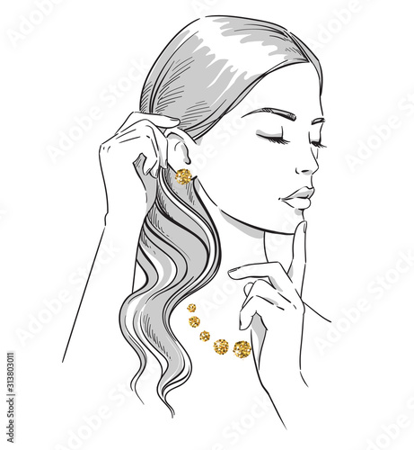 Beauty illustration. Fashion portrait of a woman with hands at her face wearing golden jewellery