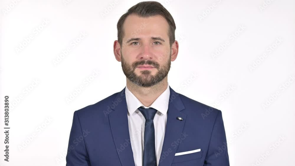 Businessman Looking at the Camera, White Background Businessman Looking at the Camera, White Background