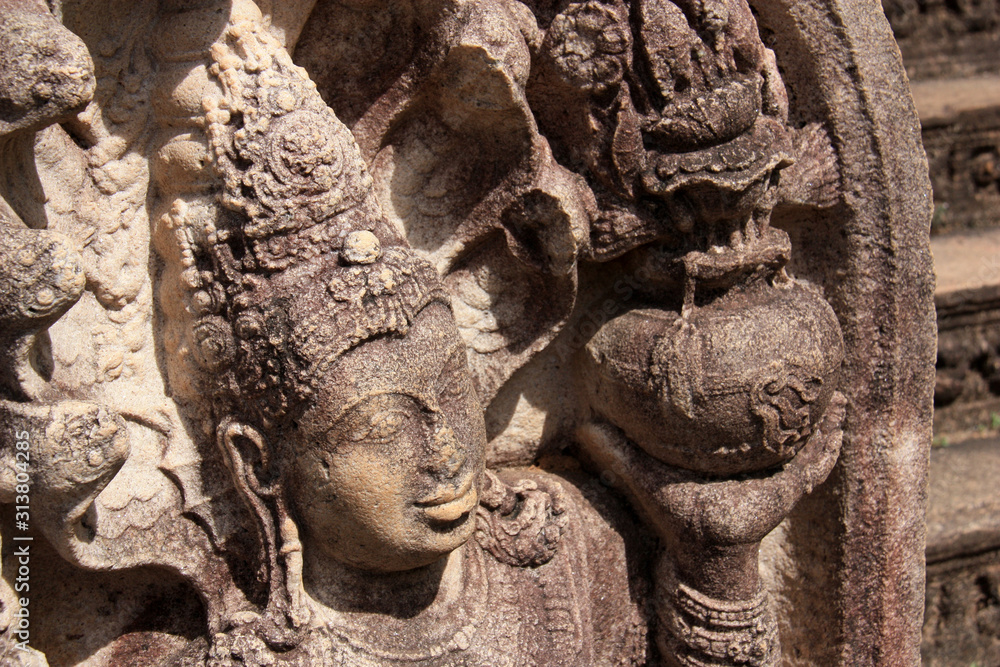 Relief of a Goddess at the entrance to the great Vatadage in the royal ancient city of Polonnaruwa in Sri Lanka