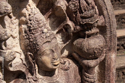 Relief of a Goddess at the entrance to the great Vatadage in the royal ancient city of Polonnaruwa in Sri Lanka